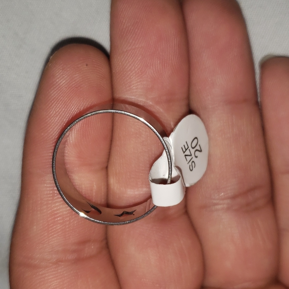 A stainless steel fashion ring with the moon 🌙 and a  star 🌟 shape on it
